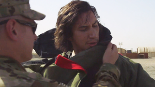 Marine Turned <i>Star Wars</i> Villain Adam Driver Tries On A Bomb Suit In Kuwait